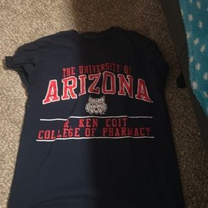 U of a pharmacy shirt